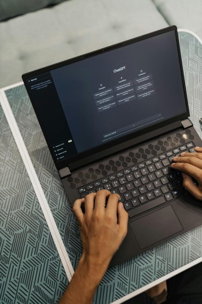 This is a AI feature image for this blog where a person is holding a laptop